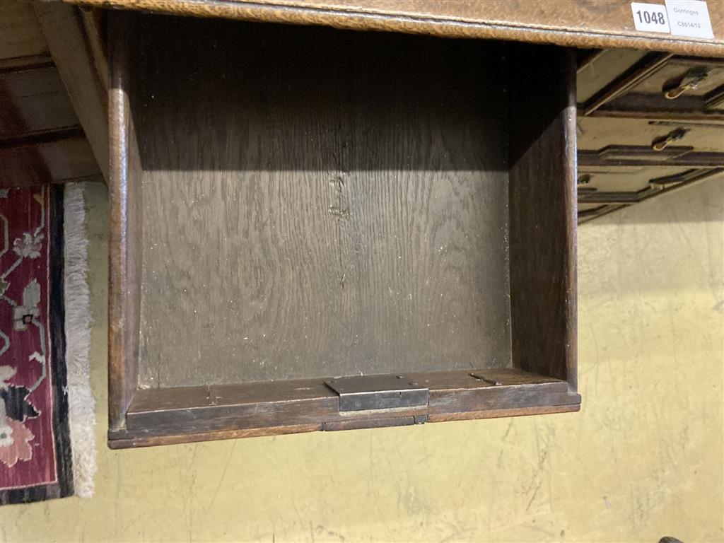 An early 18th century geometric moulded oak chest of drawers, width 96cm, depth 54cm, height 94cm